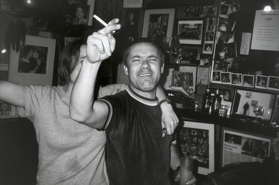 Damien Hirst with Sarah Lucas, Colony Room, London, 1999