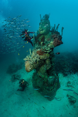 Two Figures with a Drum Discovered by Two Divers