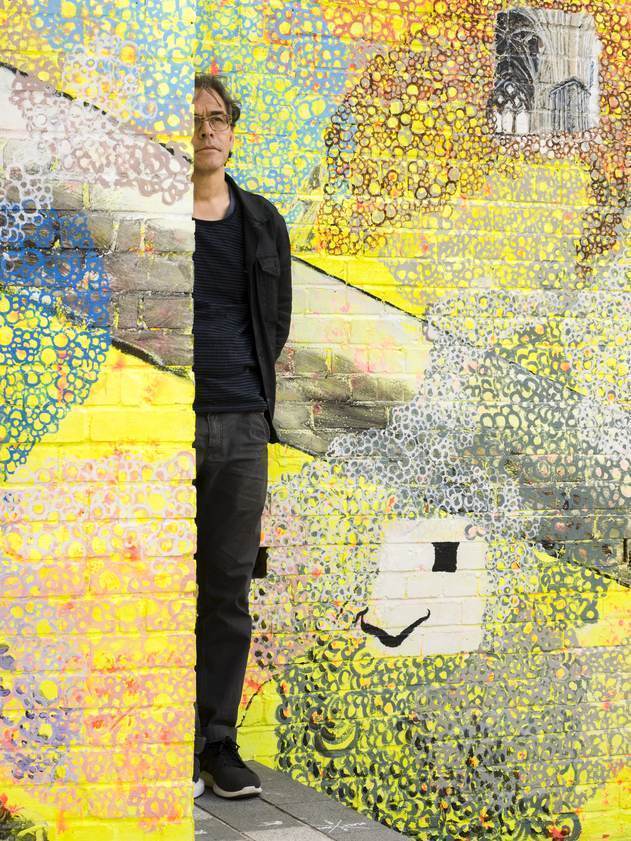 Jeffrey Dennis in front of his public artwork 'The Luton Host', 2017 by Jeffrey Dennis © Jeffrey Dennis. All rights reserved, DACS/Artimage 2018. Photo: Joe Plommer Jeffrey Dennis in front of his public artwork 'The Luton Host', 2017