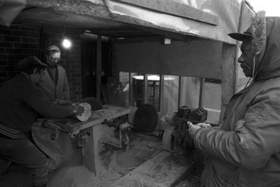 Striking miners from Armthorpe NUM cutting logs for firewood...