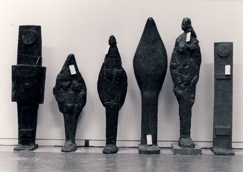 Tate retrospective, 1973 (including Totemic Figure, 1957; Female Figure, 1955; Idol 1, 1955; Idol 4, 1956; Standing Female Figure, 1955 and Screwhead, 1957) by William Turnbull © Estate of William Turnbull. All rights reserved, DACS/Artimage 2018. Photo: Kim Lim Tate retrospective, 1973 (including Totemic Figure, 1957; Female Figure, 1955; Idol 1, 1955; Idol 4, 1956; Standing Female Figure, 1955 and Screwhead, 1957)